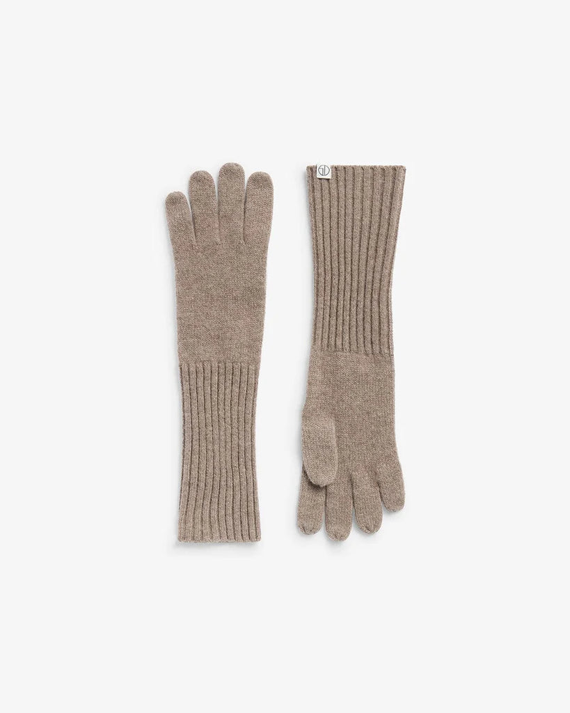 Pair of beige gloves on a white background