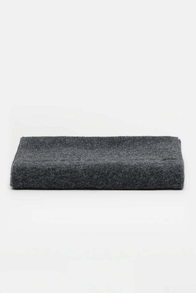 Dark gray rectangular cushion on a white background