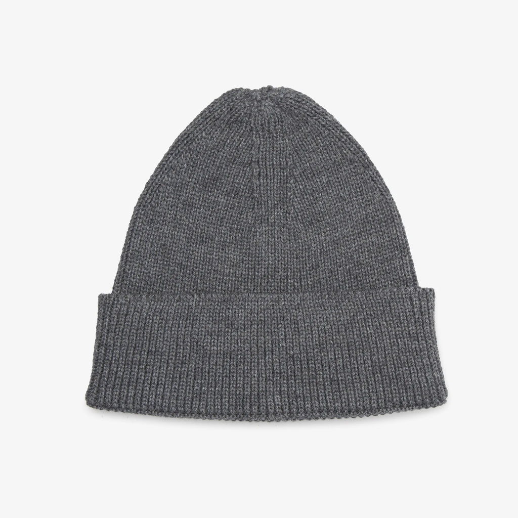 Gray knit beanie on a light gray background