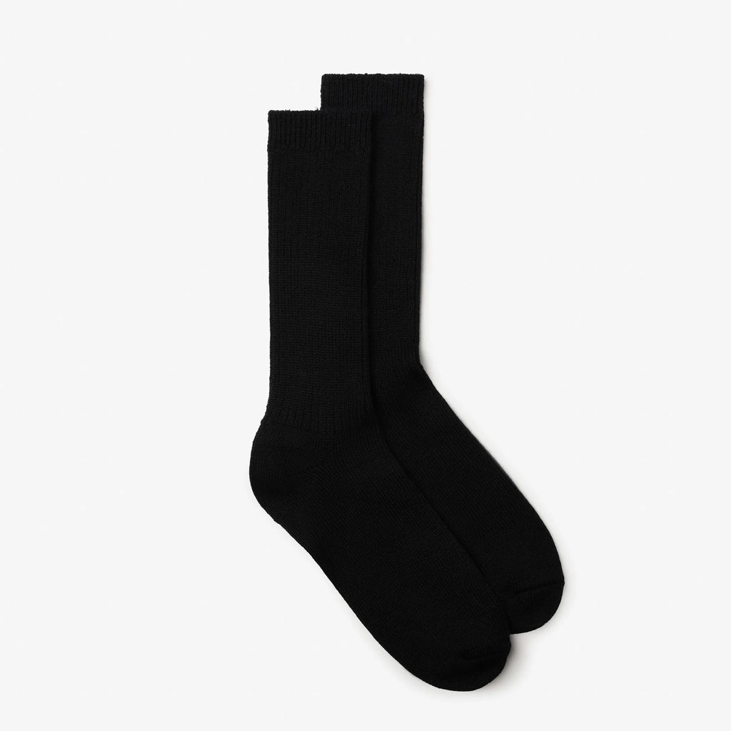 Pair of black socks on a white background