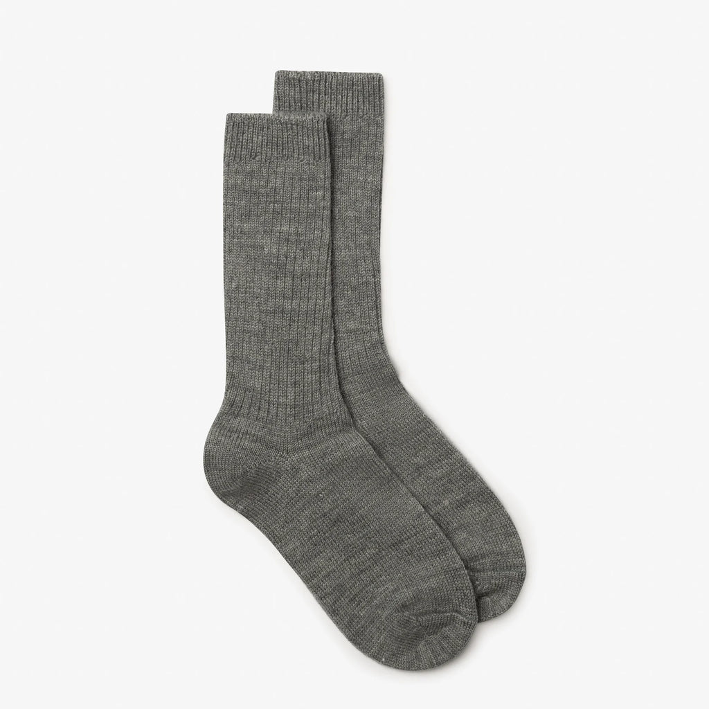 Pair of gray socks on a white background